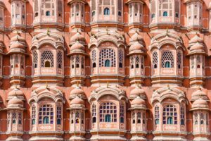 Close-up view of Hawa Mahal's detailed facade showcasing Mughal architecture in Jaipur, India.